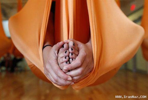 ورزش بسیار عجیب برای مقابله با جاذبه زمین +عکس