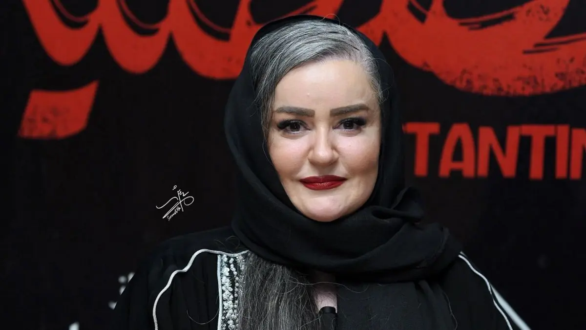 عکس قابی از نعیمه نظام‌دوست و رضا نیکخواه در یک مراسم